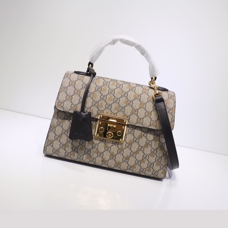 G*u*i top handle bags